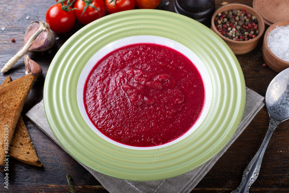 Tasty appetizing summer tomato soup puree gazpacho with tomatoes Tasty appetizing summer tomato soup puree gazpacho with tomatoes