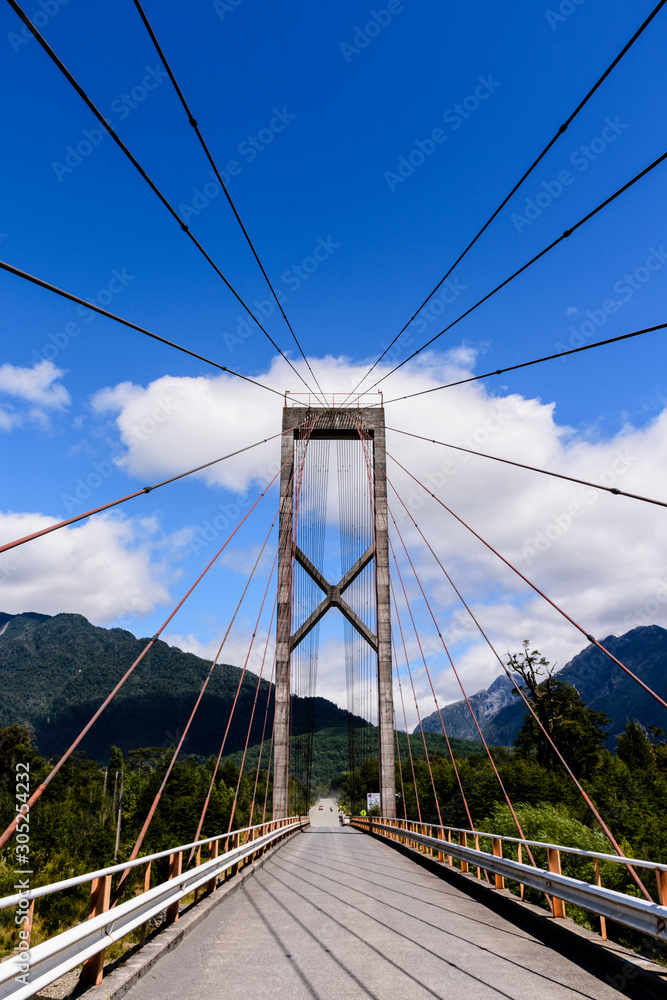 Suspension bridge over Yelcho Lake in Puerto Cardenas, Los Lagos region, Patagonia, Chile