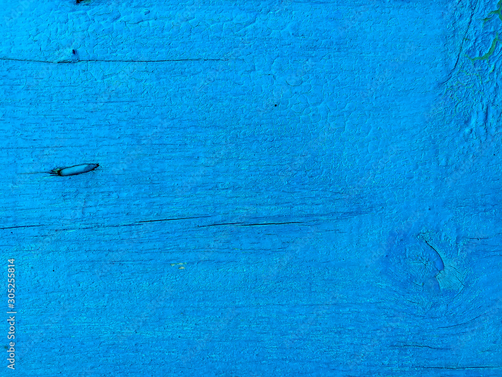 Obraz premium texture of old painted shabby rustic wooden fence made of planks, with rusty nails, grunge background