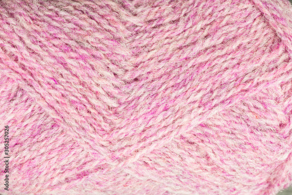 Fototapeta premium background of ball of shetland wool in pink