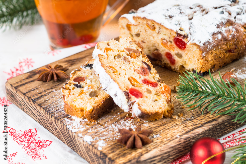 Stollen traditional Christmas ftuitcake with dried fruit and nut Stollen traditional Christmas ftuitcake with dried fruit and nut