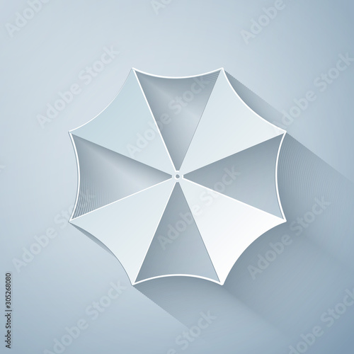 Paper cut Sun protective umbrella fo beach icon isolated on grey background. Large parasol for outdoor space. Beach umbrella. Summer vacation or picnic accessory. Paper art style. Vector Illustration