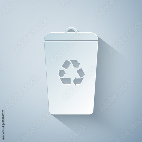 Paper cut Recycle bin with recycle symbol icon isolated on grey background. Trash can icon. Garbage bin sign. Recycle basket sign. Paper art style. Vector Illustration