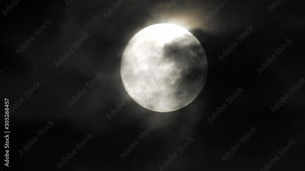 moon at night with cloud real time. 4k video full moon in the black sky. Clouds passing by moon at night. night sky with cloudy weather moon at night with cloud real time. 4k video full moon in the black sky. Clouds passing by moon at night. night sky with cloudy weather