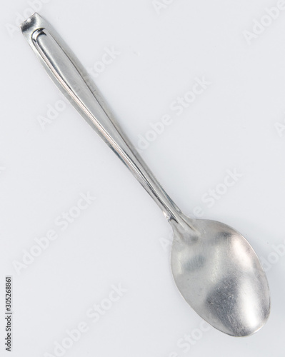 A metal spoon for breakfast or tea