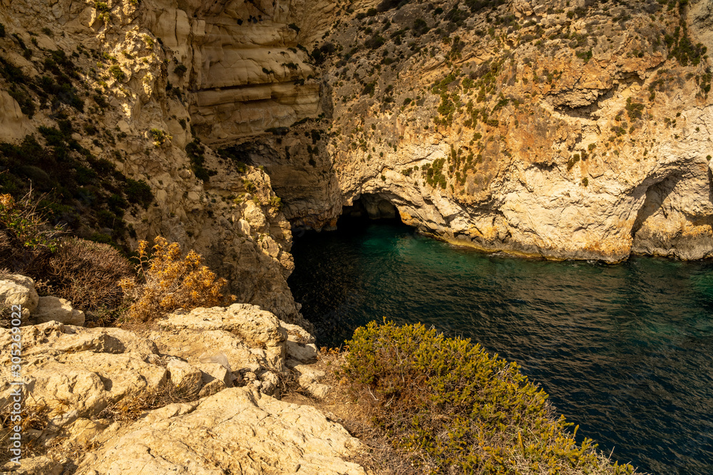 view of malta coast and mediterranean sea at blue grotto, malta