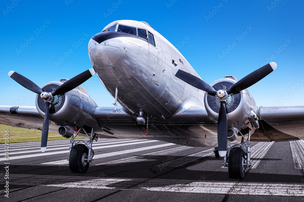Fototapeta premium historical aircraft on a runway