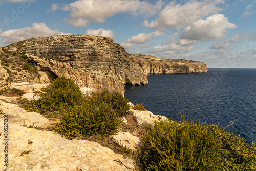 view of malta coast and mediterranean sea at blue grotto, malta