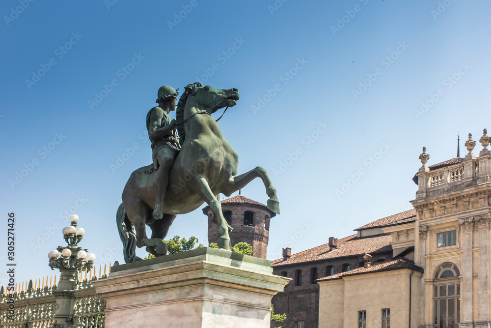 Naklejka premium Statue of a horse rider in front of the Royal Palace (Palazzo Reale) in Turin (Torino), Piedmont (Piemonte), Italy