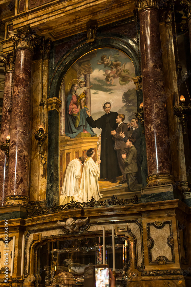 Turin, Italy, 27 June 2019: Interior of the Salesian Church of Our Lady Help of Christians in Turin, Italy. Sarcophacus and don Bosco's relics