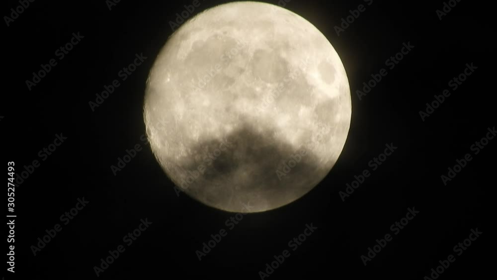 moon at night with cloud real time. 4k video full moon in the black sky. Clouds passing by moon at night. night sky with cloudy weather moon at night with cloud real time. 4k video full moon in the black sky. Clouds passing by moon at night. night sky with cloudy weather