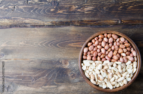 peanuts on wooden background