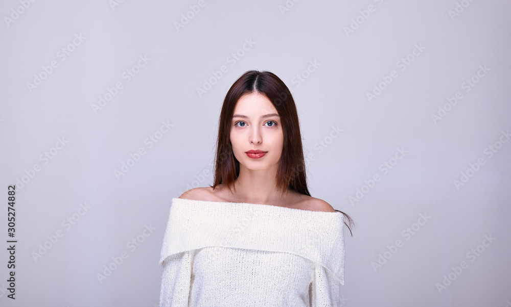 Sexy brunette calmly stares straight. Sexy brunette calmly stares straight.