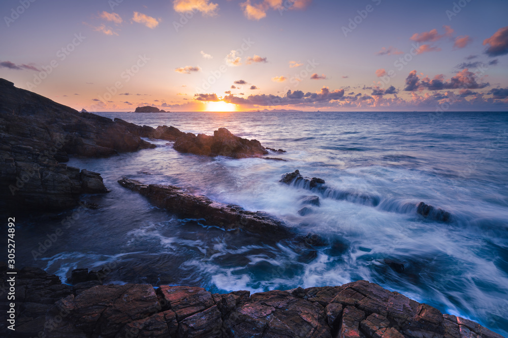 The Waves of the Sea Washing Over the Rocky Seashore