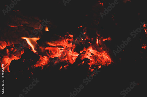 Beautiful bright hot coals of bonfire. Close-up.