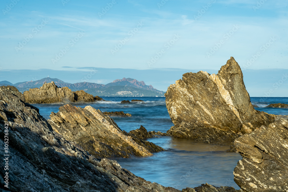 long exposure of rocks at the mediterranean sea near nice long exposure of rocks at the mediterranean sea near nice