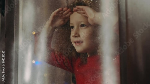 New Year Holiday. Six-Year-Old Curly Girl.