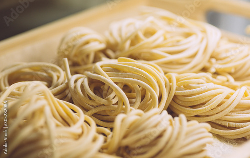Konstfotografi Pasta fresh (italian spaghetti) in classic style on white background