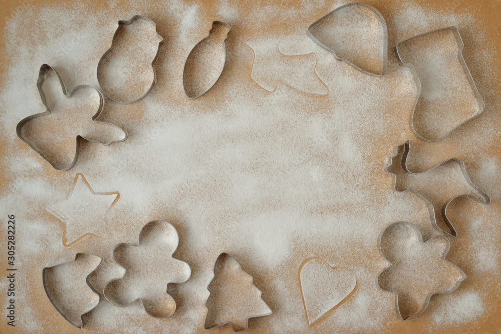 cookie cutters and cookies not a wooden background with icing sugar cookie cutters and cookies not a wooden background with icing sugar