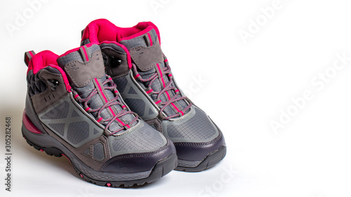 Mountain light gray boots on a white background