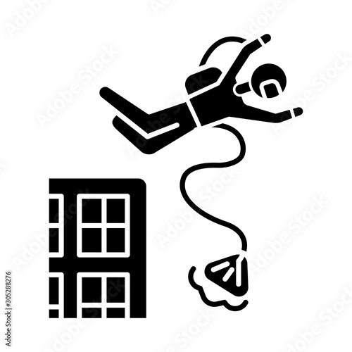 Base jumping glyph icon. Parachuting. Skydiver, parachutist jumping from skyscraper, high rise building. Extreme sport freefall stunt. Silhouette symbol. Negative space. Vector isolated illustration