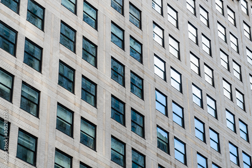 Street view over building facade with lines and windows. Graphic pattern architecture, urban concept, Manhattan, New York., USA