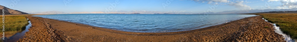Karakul lake and Pamir range in Tajikistan