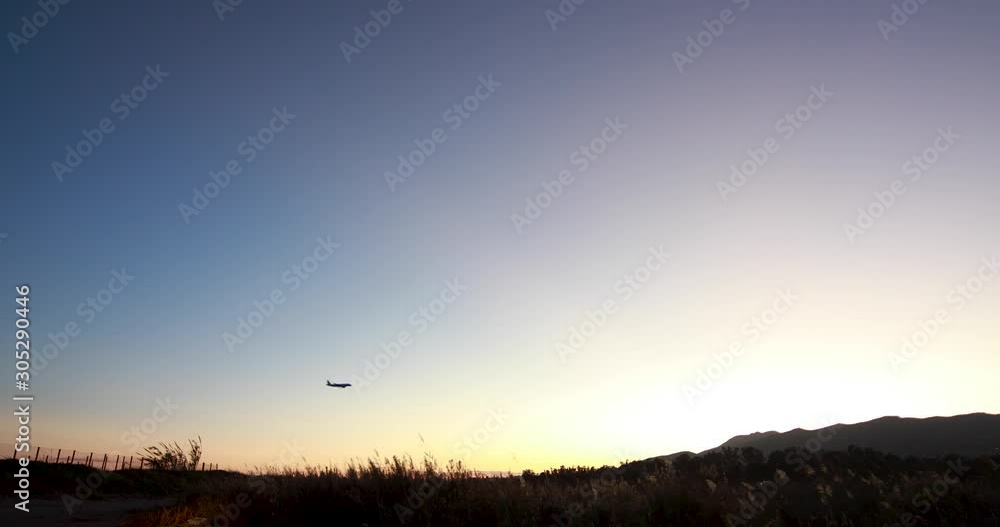 A plain landing in Málaga. Sunset in the Costa del sol A plain landing in Málaga. Sunset in the Costa del sol