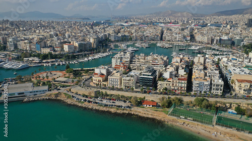 Aerial drone panoramic photo of iconic and busy port of Piraeus one of the largest in Mediterranean sea
