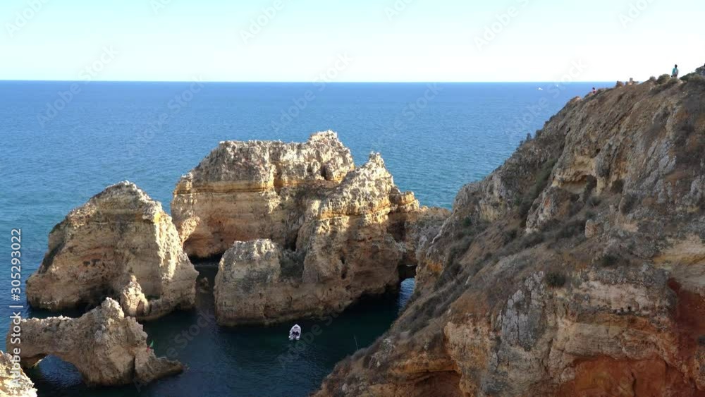 Portuguese landscape with tourist boats on the beach Ponta de Piedade, Lagos. Algarve. Portuguese landscape with tourist boats on the beach Ponta de Piedade, Lagos. Algarve.