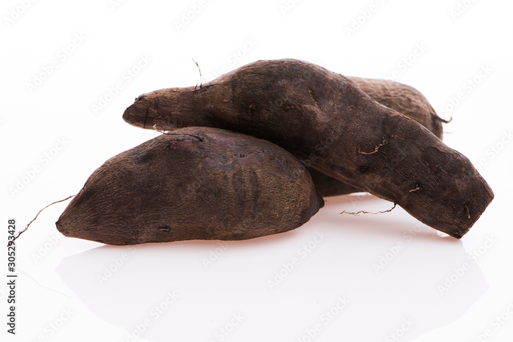Fototapeta premium Fresh Yacon roots on white background
