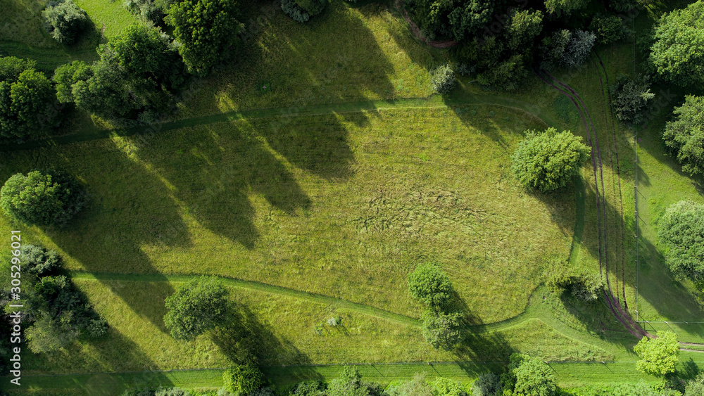 Overhead drone photo of countryside hay field just before sunset Overhead drone photo of countryside hay field just before sunset