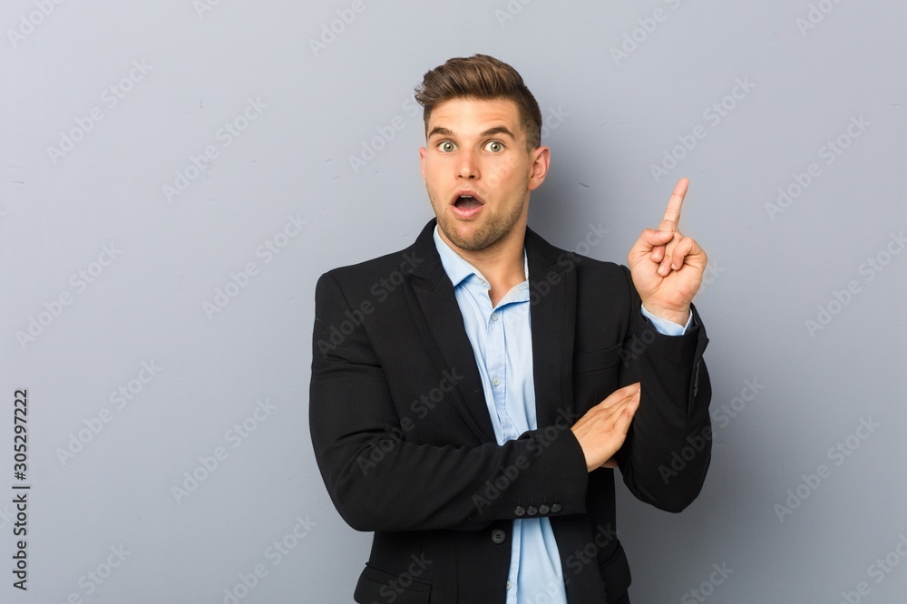 Young handsome caucasian man having some great idea, concept of creativity.