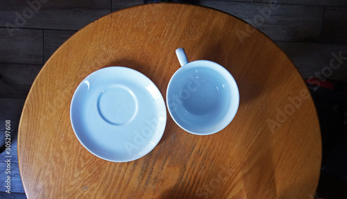 white coffee mug empty on the wooden table