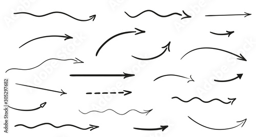 Arrow on isolated white background. Hand drawn wavy arrows. Set of different pointers. Black and white illustration photo