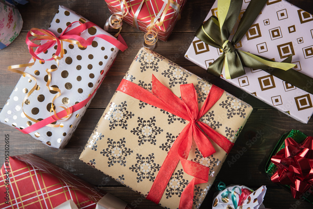 pile of wrapped gift boxes, holiday image pile of wrapped gift boxes, holiday image