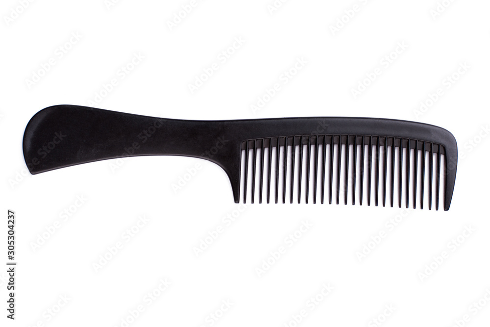 Black hair comb on white background. Plastic hair brush and copy space. - obrazy, fototapety, plakaty 