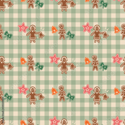 Brown gingerbread man and woman cookies in a classic checked pattern in green. Colorful, cute hand-drawn illustration with a touch of vintage design