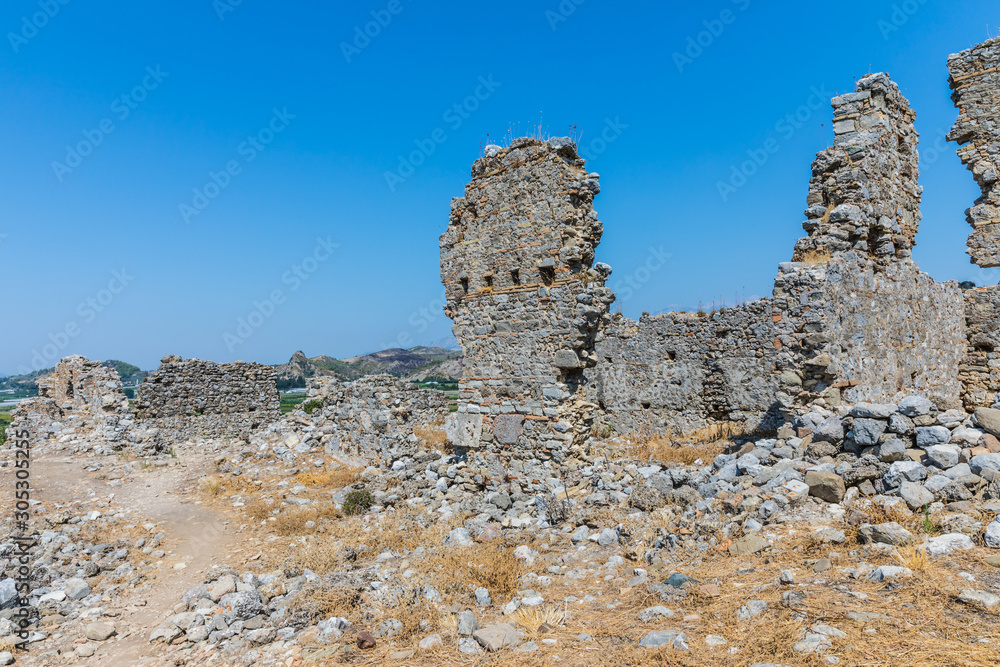 Aspendos or Aspendus, an open-air museum, an ancient Greco-Roman city in Antalya province of Turkey. Aspendos or Aspendus, an open-air museum, an ancient Greco-Roman city in Antalya province of Turkey.