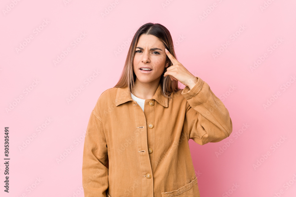 Young caucasian woman isolated showing a disappointment gesture with forefinger. Young caucasian woman isolated showing a disappointment gesture with forefinger.