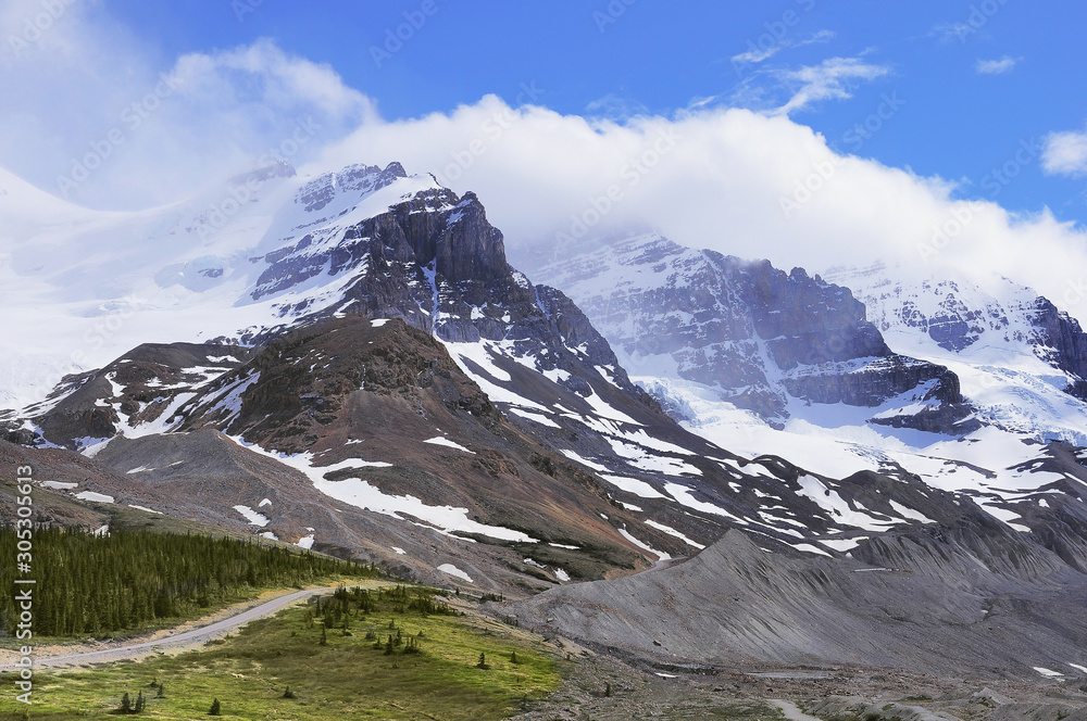 Mountains by Athabasca Glacier - part of Columbia Icefield. Jasper National Park, Alberta, Canada. Mountains by Athabasca Glacier - part of Columbia Icefield. Jasper National Park, Alberta, Canada.