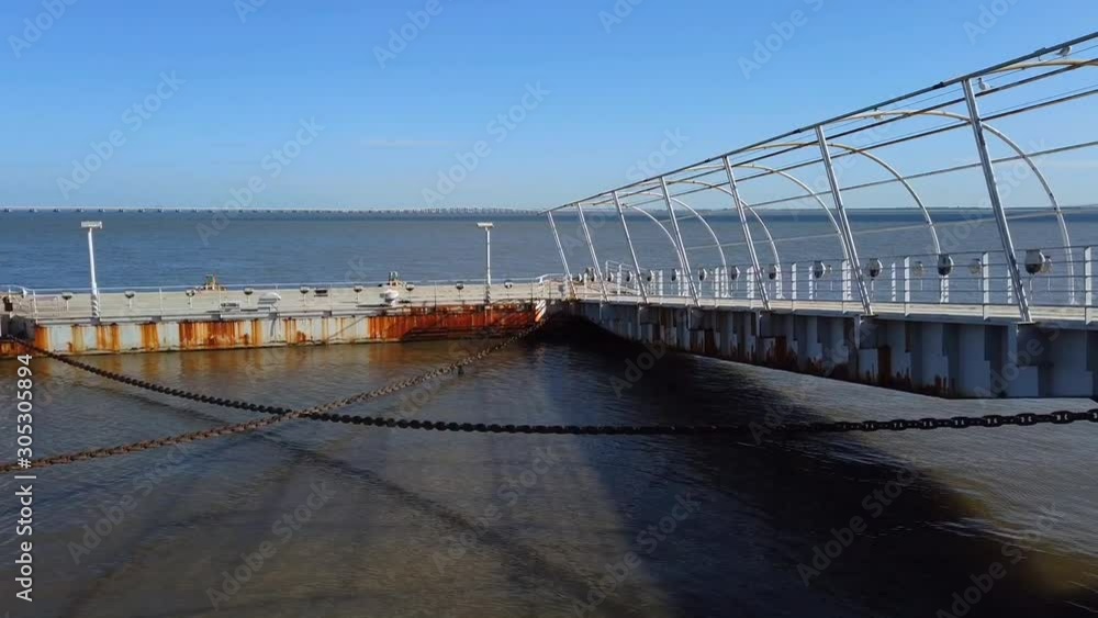 Sea iron pier with mooring bollard. Sea iron pier with mooring bollard.