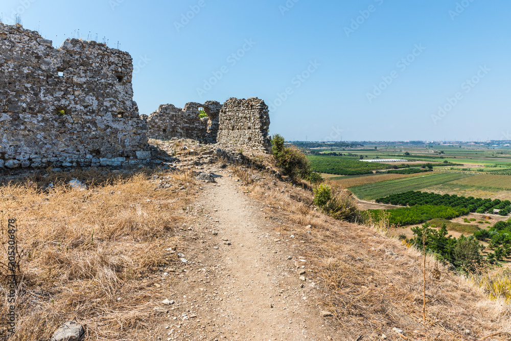 Aspendos or Aspendus, an open-air museum, an ancient Greco-Roman city in Antalya province of Turkey. Aspendos or Aspendus, an open-air museum, an ancient Greco-Roman city in Antalya province of Turkey.