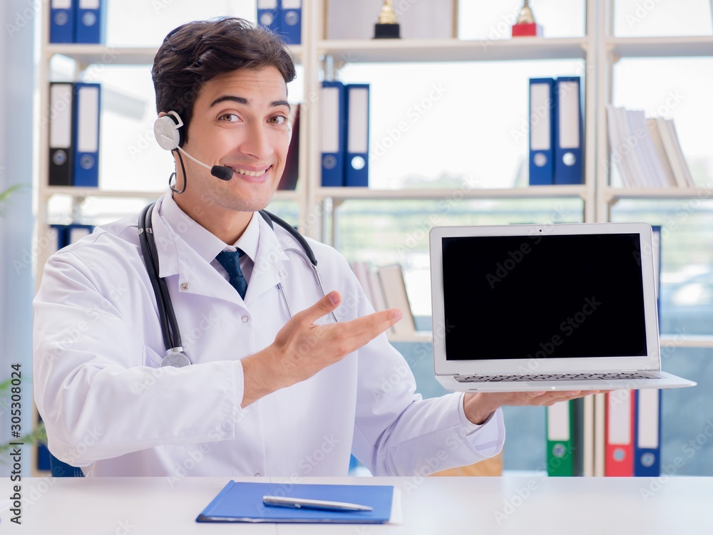 Young male doctor in telehealth concept Young male doctor in telehealth concept