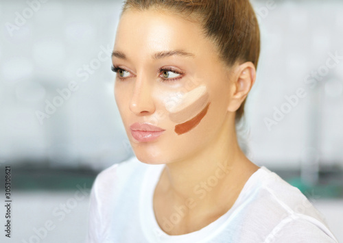 Contouring.Make up woman face. Contour and highlight makeup 