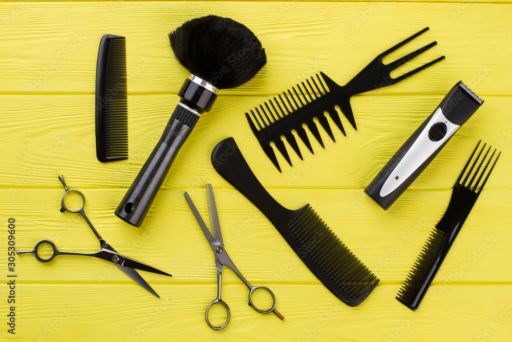 Stylish professional hairdresser tools on color background. Hairdresser workspace with equipment. Styling hair in barbershop.