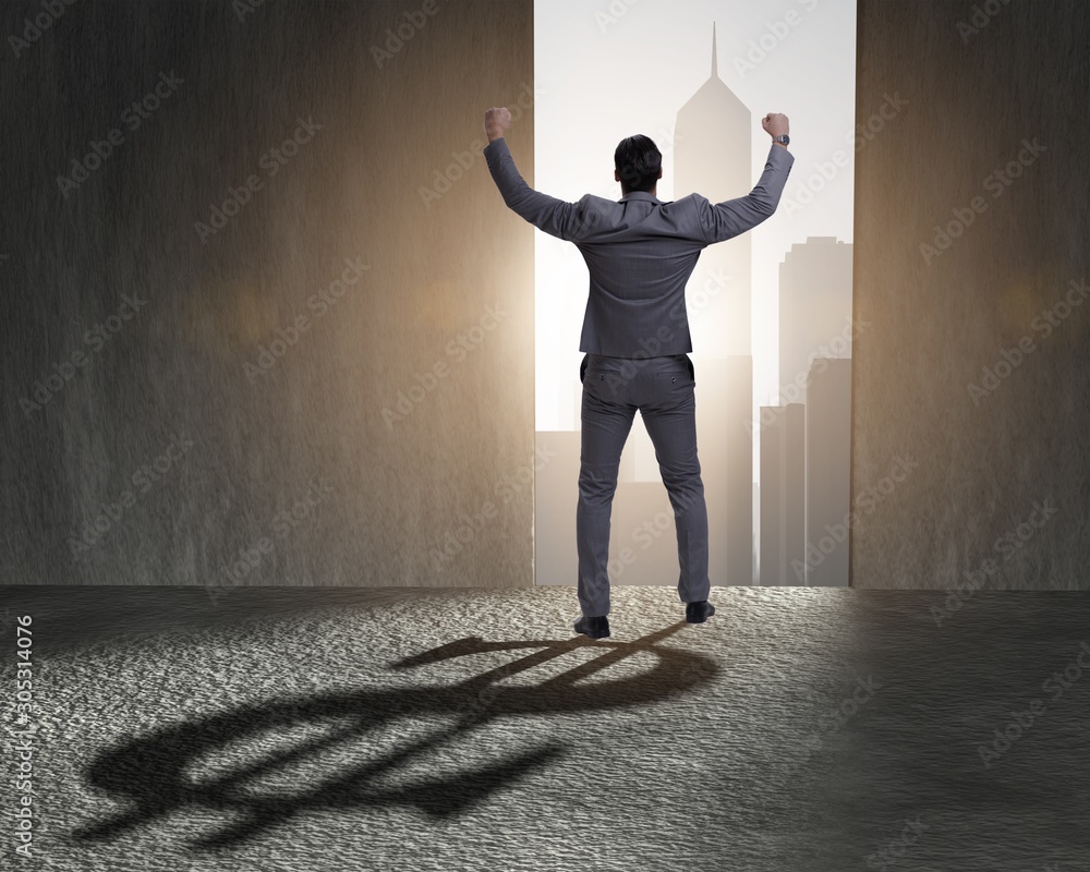 Obraz premium Businessman casting dollar shape shadow in business concept