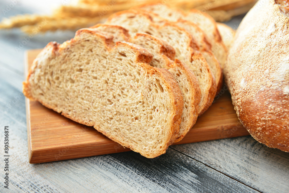 Sliced fresh bread on table