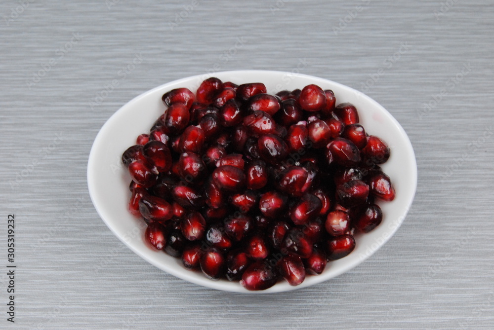 Isolated dish of Pomegranate seeds Isolated dish of Pomegranate seeds