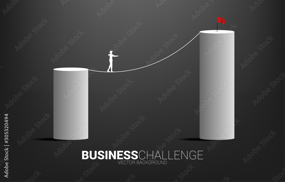 Silhouette of businessman walking on rope walk way to higher bar chart.Concept for business risk and career path Silhouette of businessman walking on rope walk way to higher bar chart.Concept for business risk and career path